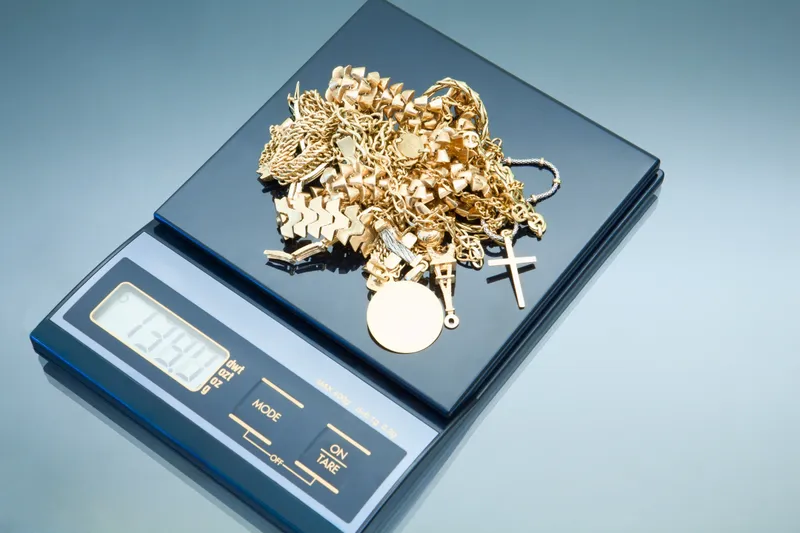 Gold jewelry on digital scale
